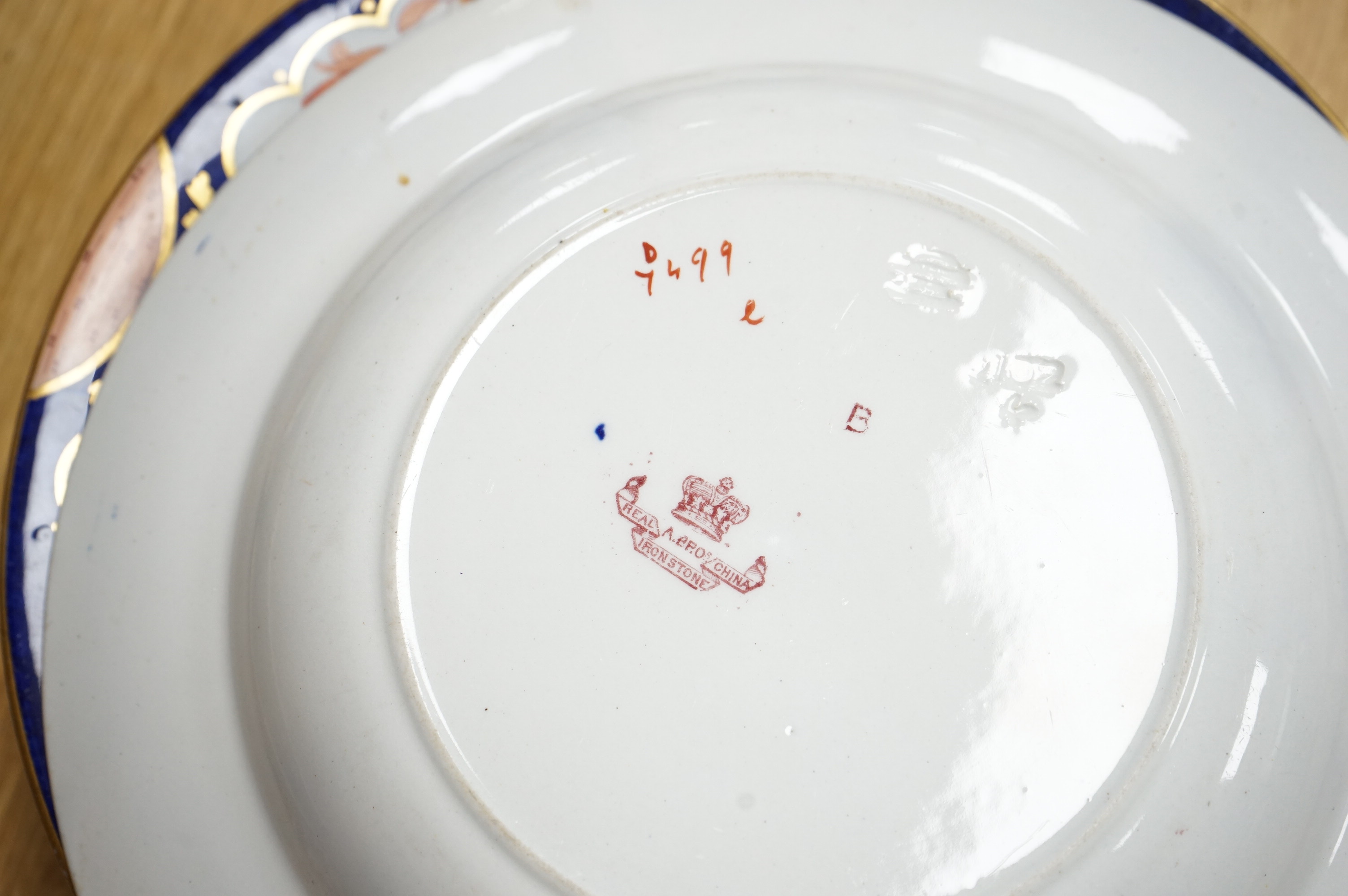 Fifteen items of a mid 19th century Mason's/Ashworth’s ironstone dinner service. Oval meat platter 48.5cm wide. Condition - three plates chipped, some losses to gilding